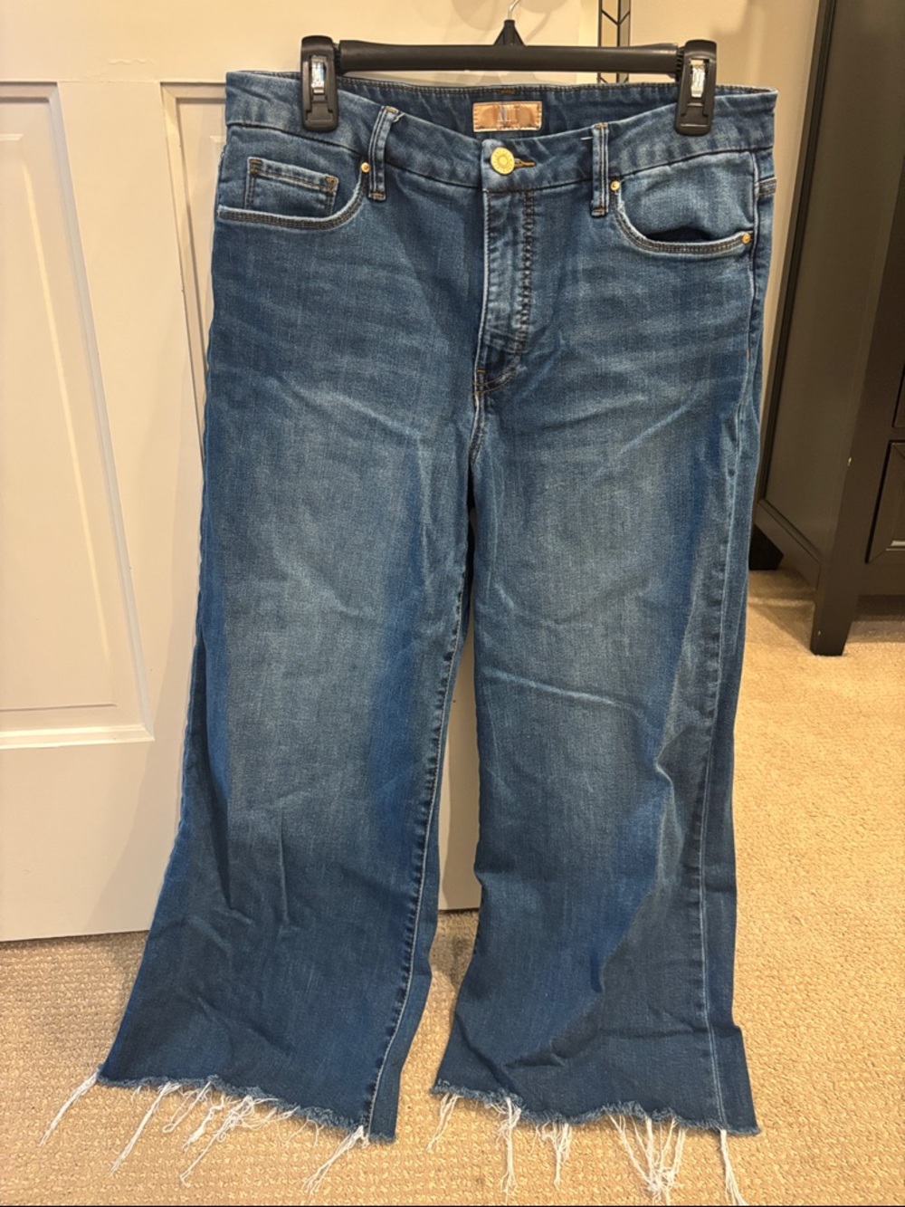 Kut from the Kloth size 10 high waisted Meg raw denim jeans